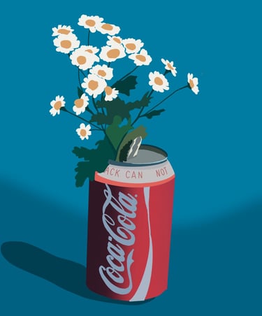 Une canette de coca qui sert de vase où sont des marguerites 