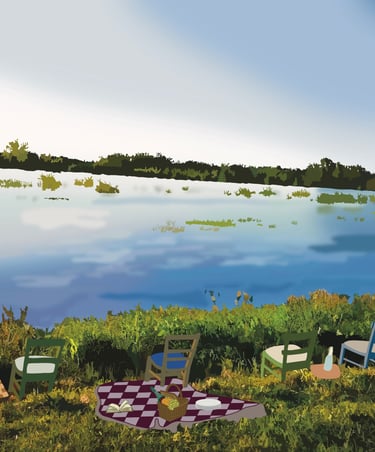 a picnic table with chairs and a picnic blanket