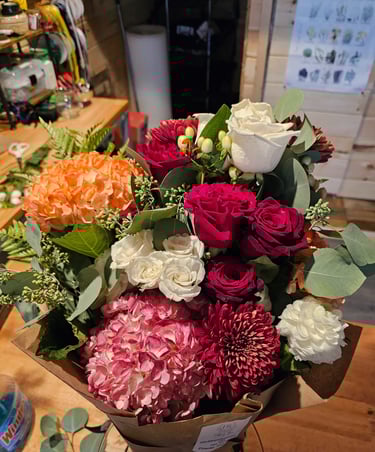 a bouquet of flowers in a box