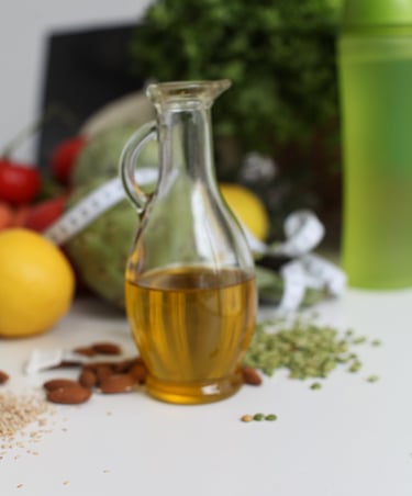 a bottle of olive oil on a table