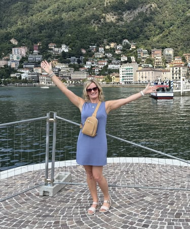 Me wearing my Skechers sandals while standing with arms up in Como at Lake Como