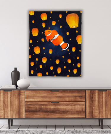 a fish bowl with a fish and a lamp on it
