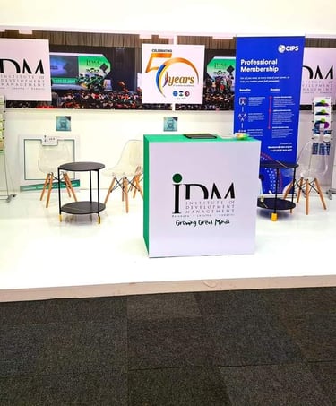 a large display of various balloons and balloons and a promotiona stand
