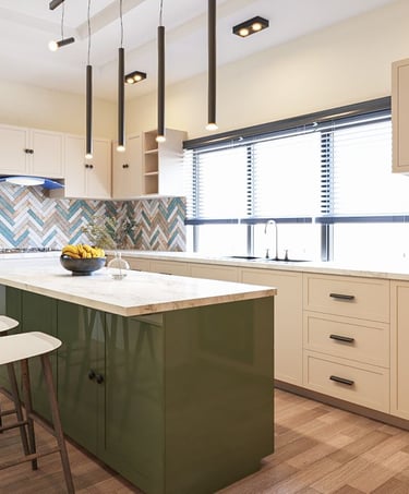 a kitchen with a large island and a bar stool