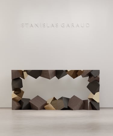 Stanislas Garaud furniture and sculpture showroom. Pyrite console, floor lamp, Pyrite coffee table, Stratum round table