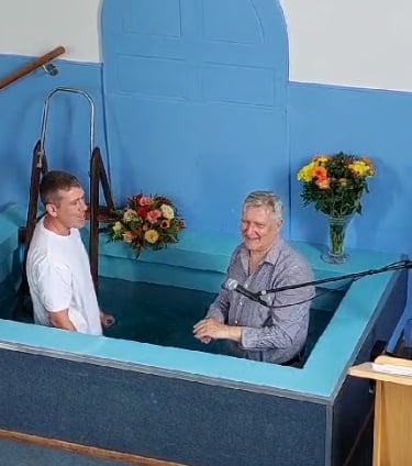 A man being baptised