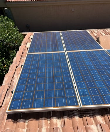 Solar panels with bird proofing mesh installed in Phoenix AZ to prevent pigeons from nesting under