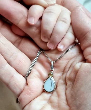 moedermelk ketting met haarlok