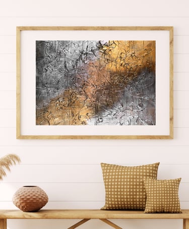 Neutral abstract painting with silver and golden bronze textures — featured in a cozy, boho-inspired
