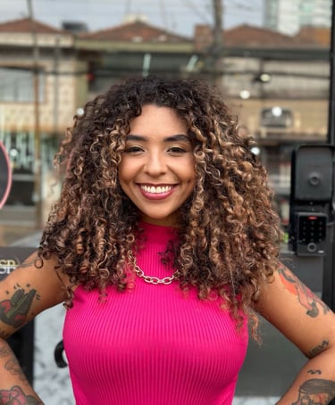 a woman with tattoos on her arms and arms