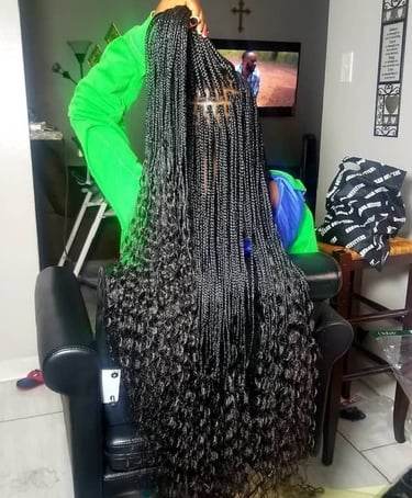 a woman with long small goddess braids