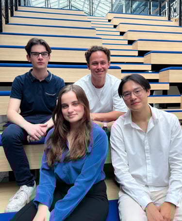 a group of people sitting on a bench in a school