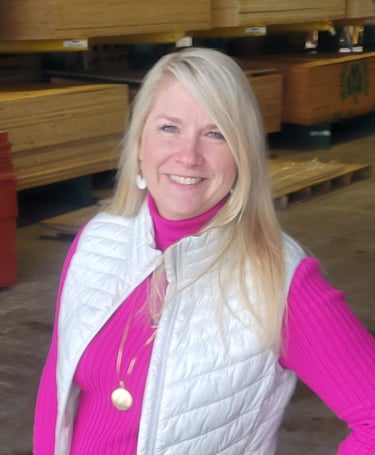 Female bookkeeper for contractors in lumber warehouse