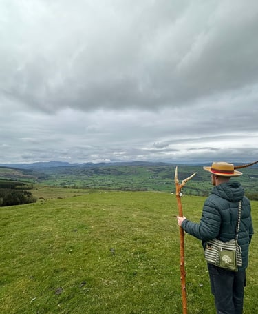 Rijusiddha looking out over the Welsh landscape