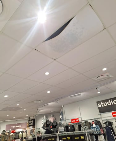 Lonehill Shopping Center roof leak damage