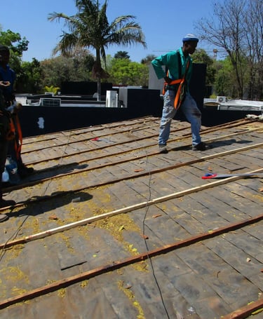 Roof stripping for roof replacent project in Hyde Park, Sandton, Environmental Pro Construction
