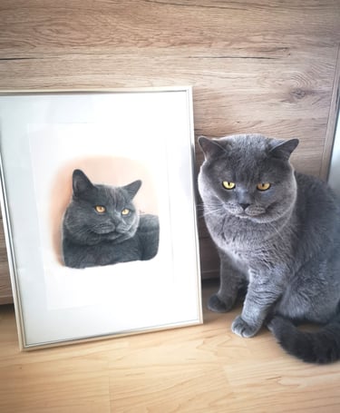 a cat sitting on a wooden floor next to a drawing of himself