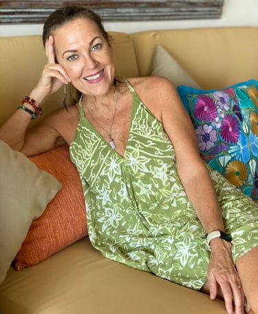 a woman sitting on a couch at retreat in Mexico