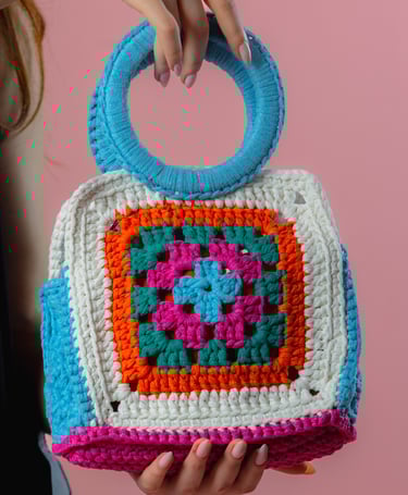 Artisanal square crochet handbag, featuring bright multicolor design by Fishberry