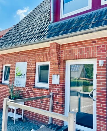 Hotel DunenNest - Ansicht vom Eingang und Schlüsselkasten, links neben der Tür