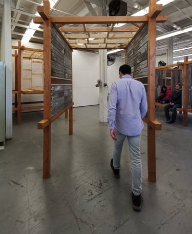 a man walking through an unfinished construction project