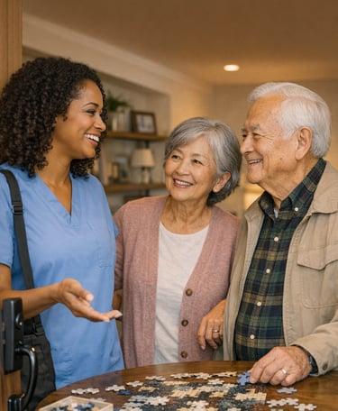 Caregiver smiling with elderly couple doing a puzzle at home in Chesterfield County Virginia