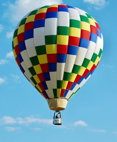 a colorful hot air balloon in the sky