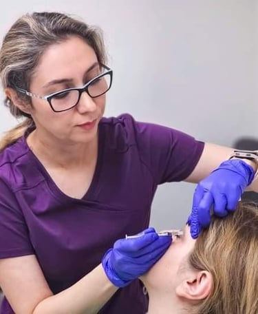 Dr. Sara Hashemzadeh is performing a Dysport injection at Ariana Esthetic Edmonton
