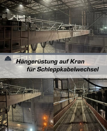 Hängegerüst an einem Industriekran für den Austausch von Schleppkabeln