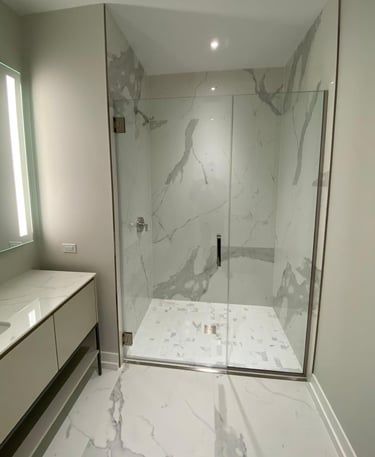 Modern bathroom remodeling project with custom walk‑in shower and tile installation in Highland Park