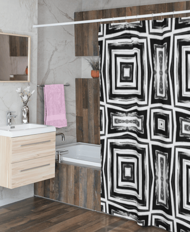 Bathroom with bath a shower curtain hanging partially close in front of the bath