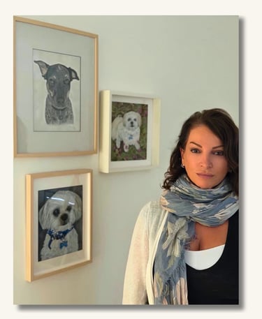 Sharan Miller with pet portrait artwork in her Australian art studio