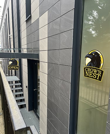 The entrance to Crow's Nest TCG.
