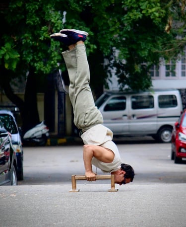 Bilal Ansari performing handstand