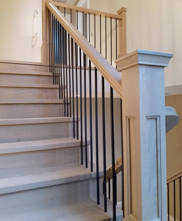 Distinctive metal railings on a staircase design for contemporary and traditional homes