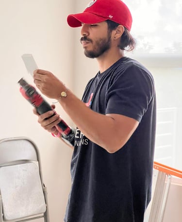 a man in a red hat and a red baseball cap
