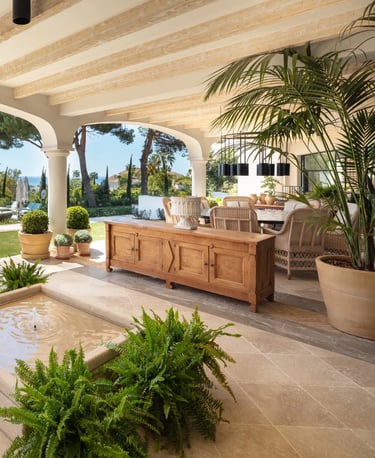 Terrace lounge at Villa La Gratitud with sea views and shaded pergola