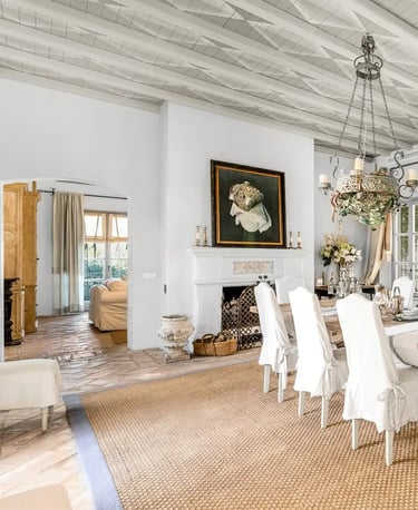 Elegant dining room with rustic beams at Finca Santa Katerina
