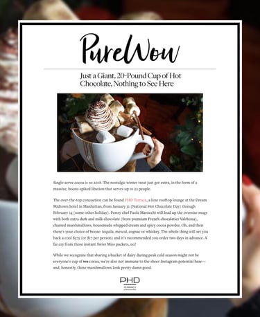 a person holding a cup of coffee and a cup of coffee