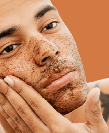 male using cafine all natural skincare product