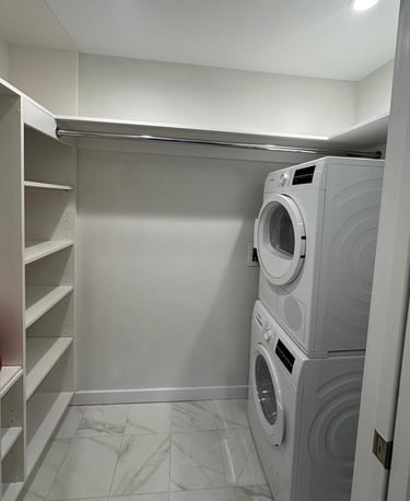 a laundry room with a washer and dryer
