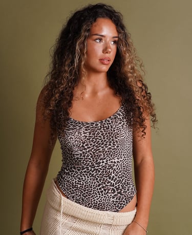 A model in a leopard print top