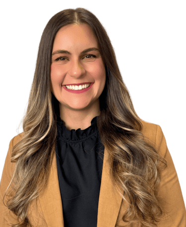 woman with long hair wearing a suit with a black shirt