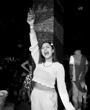 a woman in a white sweater and pants with a white sweater