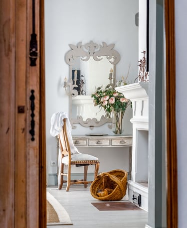 Master Suite at Finca Santa Katerina, showing antique furnitures and a fireplace
