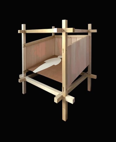 A photo of a wooden architectural model