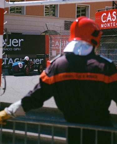 Race marshal watching pre-war Grand Prix cars race at Monaco