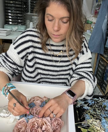 Jenny from Infinity Flowers expertly preserving a wedding bouquet