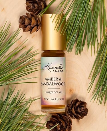 a bottle of sandalwood and amber oil fragrance