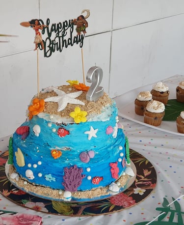 a cake with a blue and white cake topper